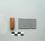 Cylinder Seal with Pleiades, Star, Crescent, and Winged Disc.