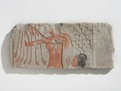 Akhenaten and His Daughter Offering to the Aten (wall relief, fragment)