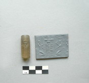 Cylinder Seal with Winged Sun Disc, Crescent Moon, and Eight-Pointed Star