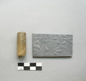 Cylinder Seal with Winged Sun Disc, Star, and Crescent Moon