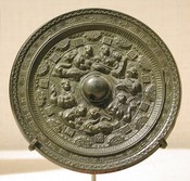 Mirror with deities and mythical creatures